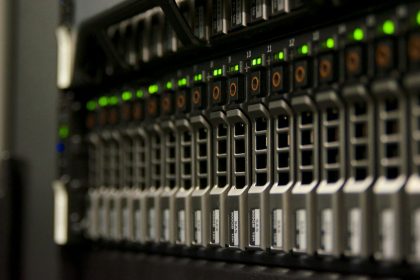 Modern data centre server racks with active indicator lights representing web hosting infrastructure